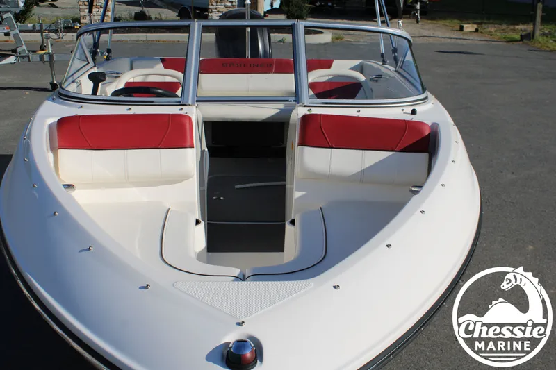 Slide: The Image of 2015 Bayliner 170 boat with red and white seats, Chessie Marine logo. - 9