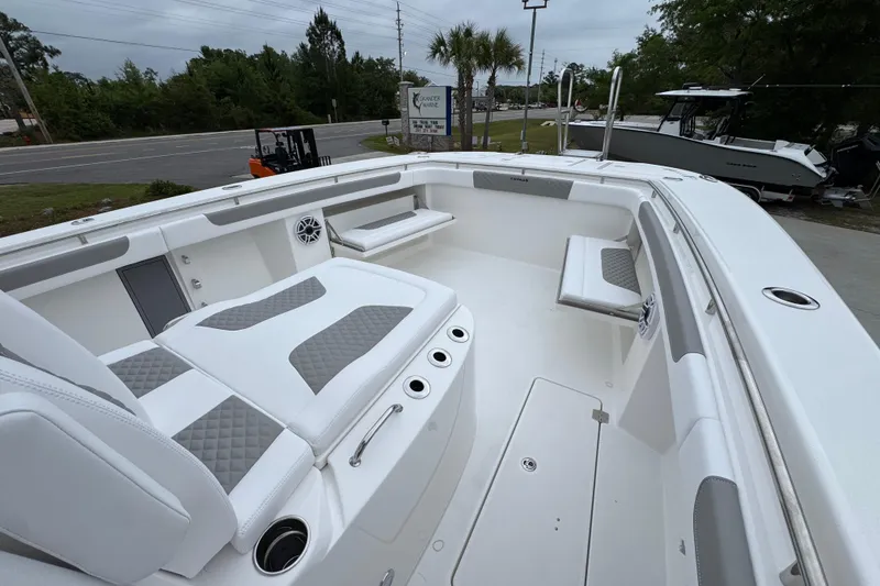 Slide: The Image of 2026 Caymas 34 CT boat interior with white seating and modern design. - 20