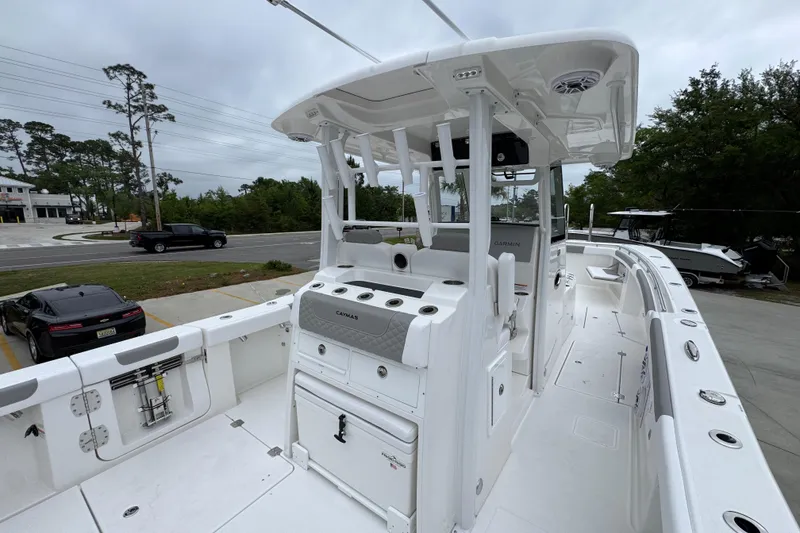 Slide: The Image of 2026 Caymas 34 CT boat with sleek white interior and advanced navigation system. - 36