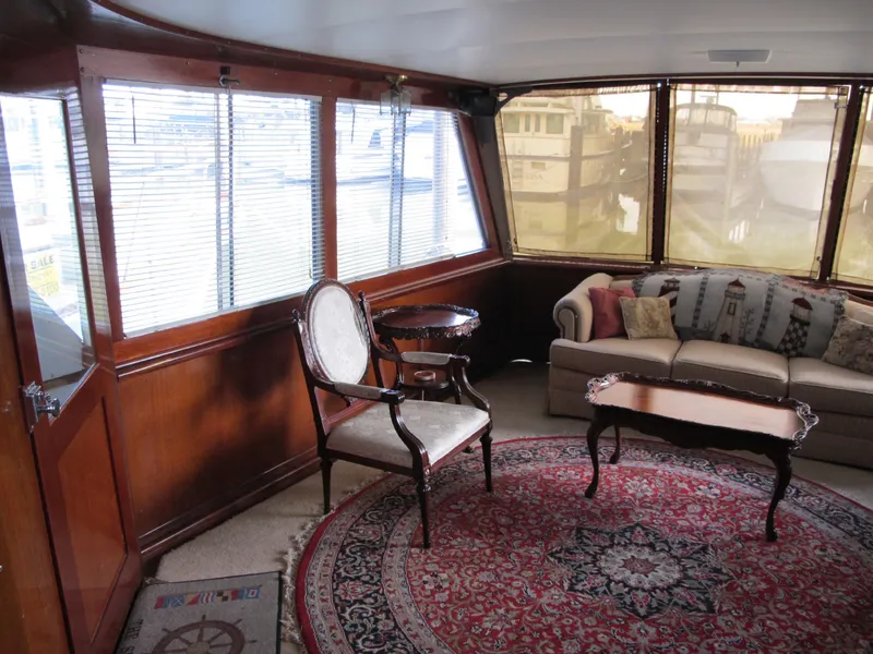 Slide: The Image of Interior of 1971 Chris-Craft 57 Constellation yacht with elegant furnishings. - 13
