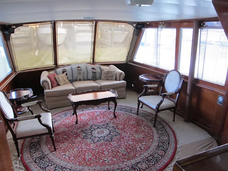 Slide: The Image of Interior of 1971 Chris-Craft 57 Constellation yacht with elegant furnishings. - 14