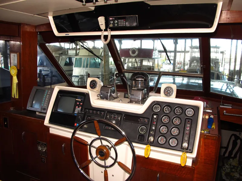 Slide: The Image of Interior view of a 1971 Chris-Craft 57 Constellation yacht cockpit. - 18