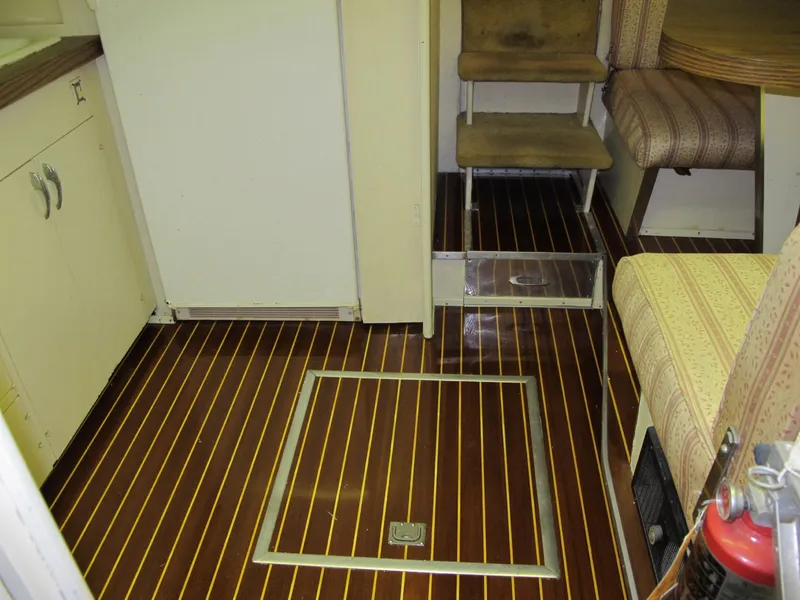 Slide: The Image of Interior of a 1971 Chris-Craft 57 Constellation with wooden flooring. - 34