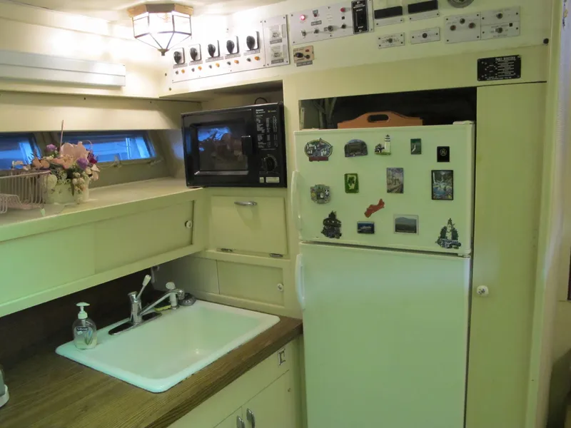 Slide: The Image of Interior of 1971 Chris-Craft 57 Constellation yacht kitchen. - 35