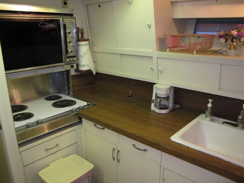 Slide: The Image of Kitchen on a 1971 Chris-Craft 57 Constellation boat. - 37