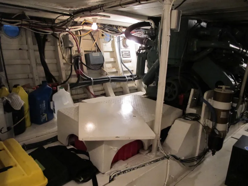 Slide: The Image of Interior of a 1971 Chris-Craft 57 Constellation boat, featuring engine and wiring. - 40