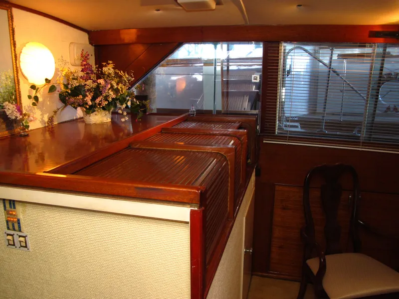 Slide: The Image of Interior of 1971 Chris-Craft 57 Constellation yacht with wooden furnishings. - 43