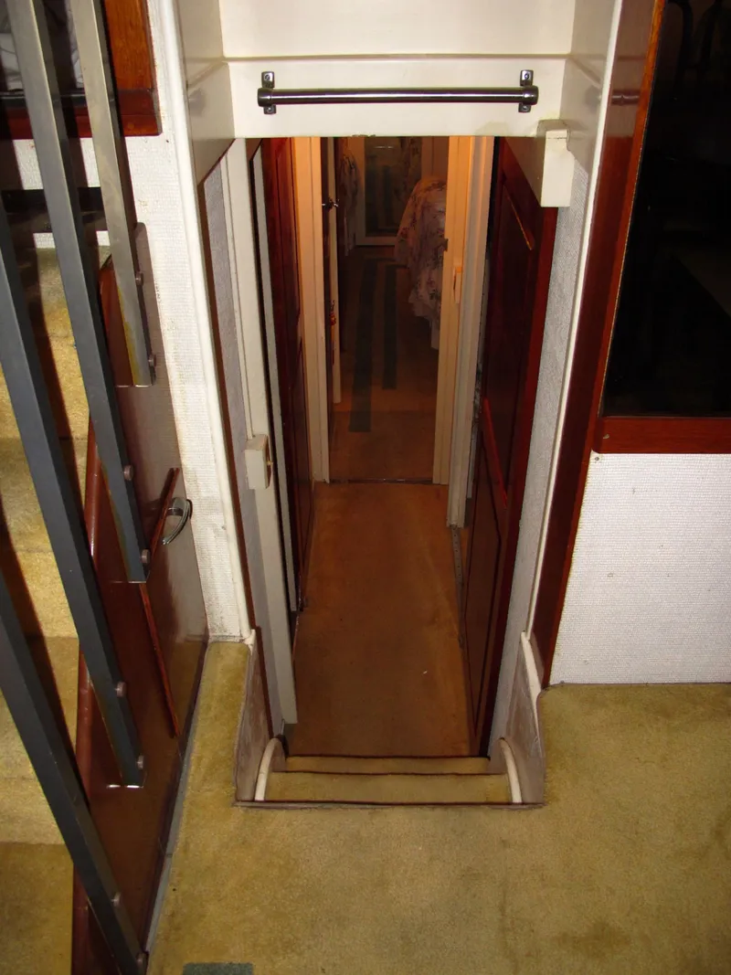 Slide: The Image of Interior of 1971 Chris-Craft 57 Constellation, narrow staircase and hallway. - 45