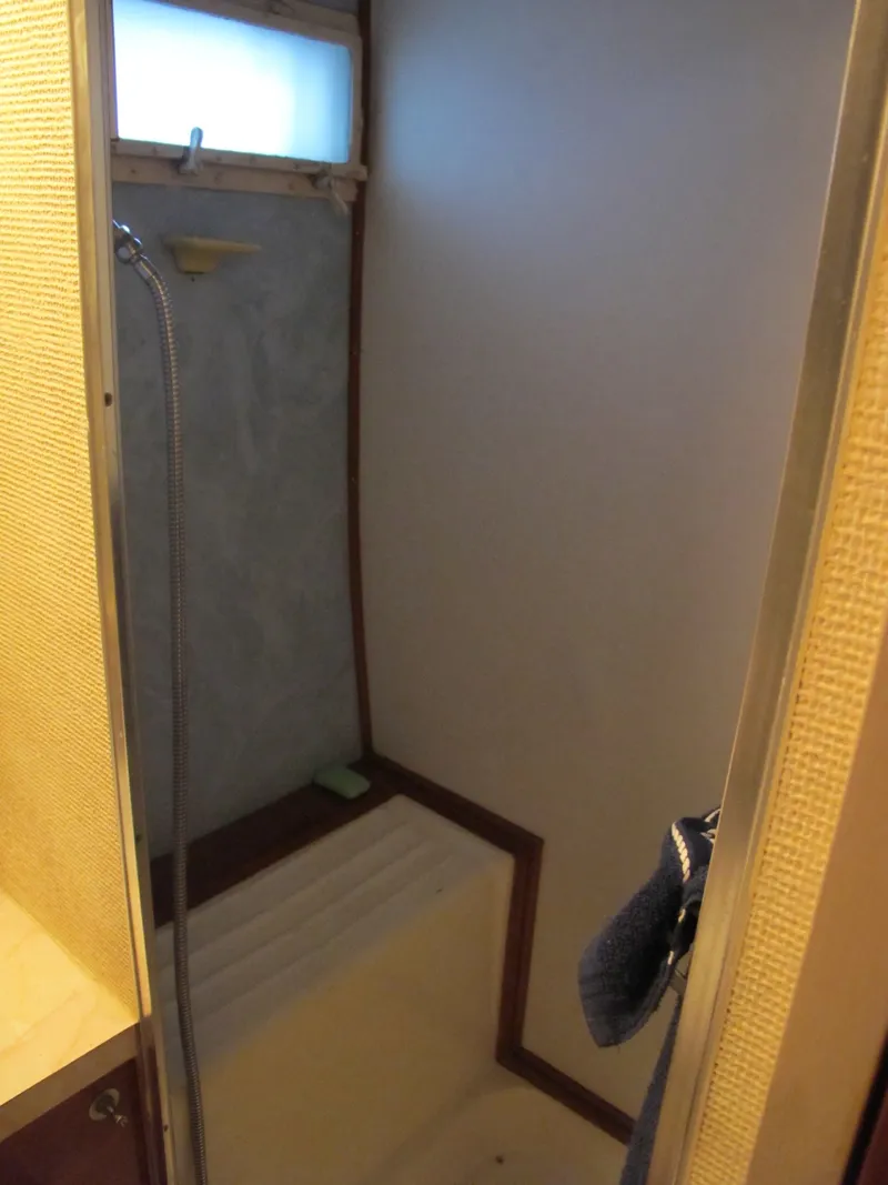 Slide: The Image of Shower in 1971 Chris-Craft 57 Constellation boat. - 49