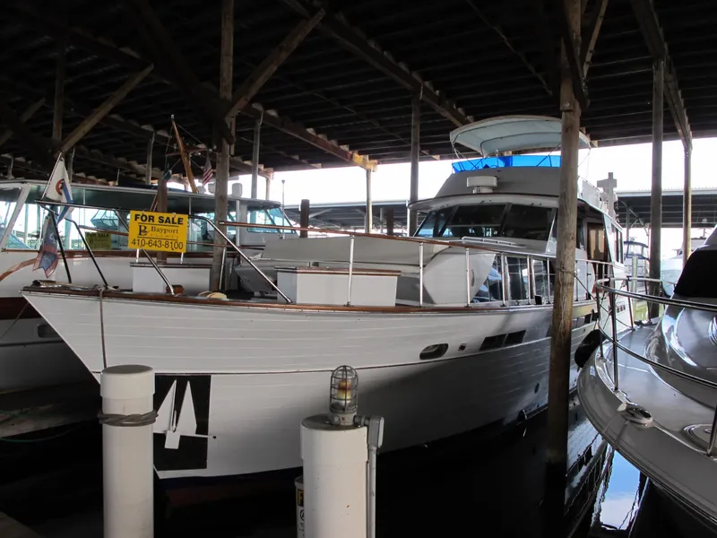 Slide: The Image of 1971 Chris-Craft 57 Constellation yacht docked for sale. - 6