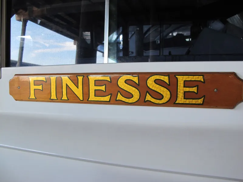 Slide: The Image of Wooden "FINESSE" sign on 1971 Chris-Craft 57 Constellation. - 7