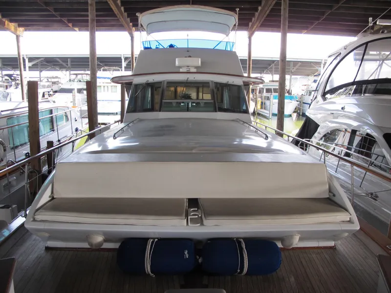 Slide: The Image of 1971 Chris-Craft 57 Constellation yacht docked in marina. - 9