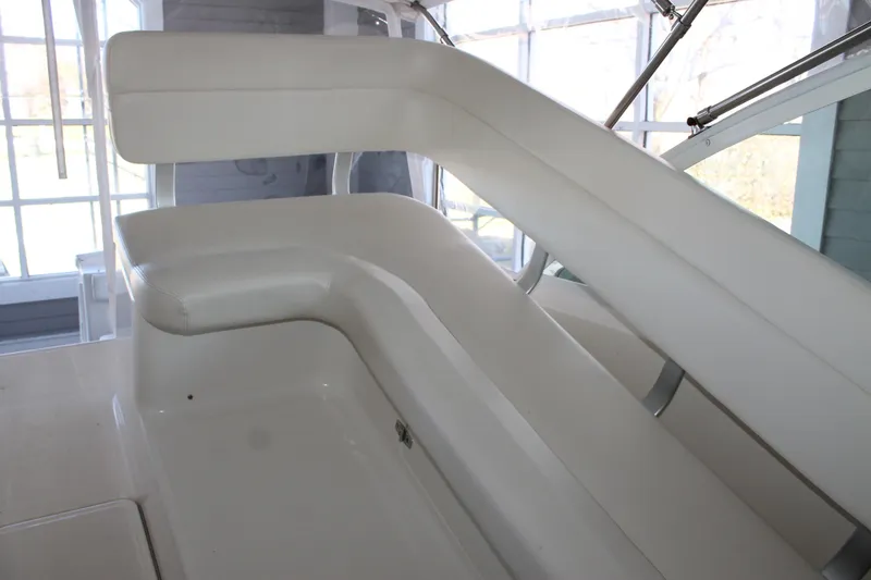 Slide: The Image of 1998 Tiara Yachts 2900 Coronet interior seating, white upholstery, modern design. - 11