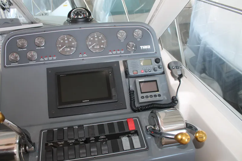 Slide: The Image of Control panel of a 1998 Tiara Yachts 2900 Coronet with gauges and navigation equipment. - 14