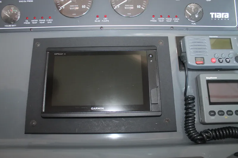 Slide: The Image of Dashboard of a 1998 Tiara Yachts 2900 Coronet with Garmin GPS and Raytheon equipment. - 15
