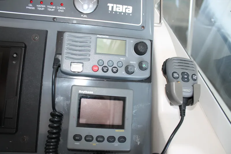 Slide: The Image of Control panel of a 1998 Tiara Yachts 2900 Coronet with Raymarine and Raytheon equipment. - 16