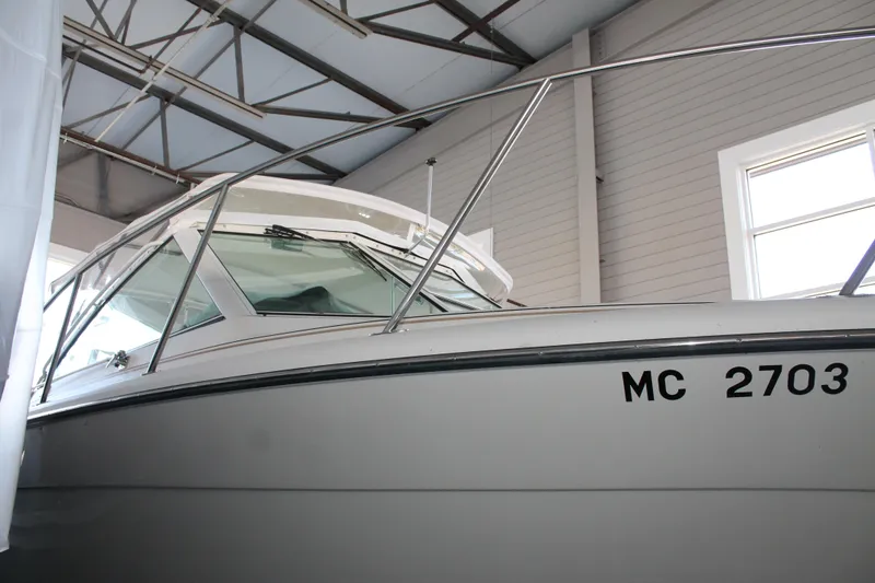 Slide: The Image of 1998 Tiara Yachts 2900 Coronet in storage, showcasing sleek design and sturdy construction. - 2