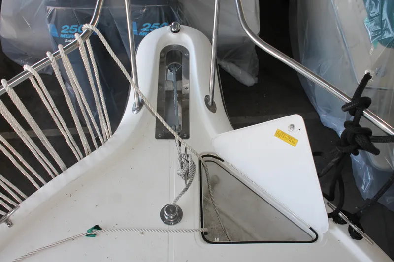 Slide: The Image of Bow of a 1998 Tiara Yachts 2900 Coronet with anchor and ropes. - 3