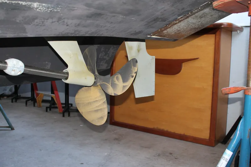 Slide: The Image of Propeller and rudder of a 1998 Tiara Yachts 2900 Coronet in a workshop setting. - 30