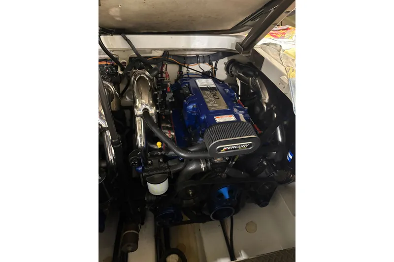 Slide: The Image of 2004 Formula 400 Super Sport engine with Mercury components, showcasing a powerful marine setup. - 43