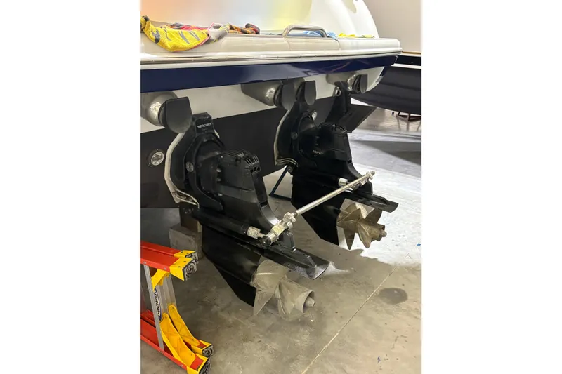 Slide: The Image of Rear view of a 2004 Formula 400 Super Sport boat with dual propellers. - 44