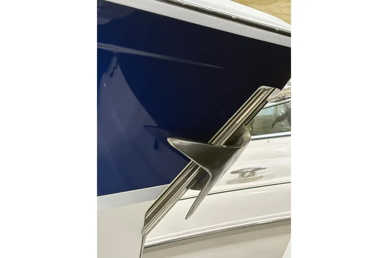 Slide: The Image of Close-up of 2004 Formula 400 Super Sport boat emblem on blue and white hull. - 7