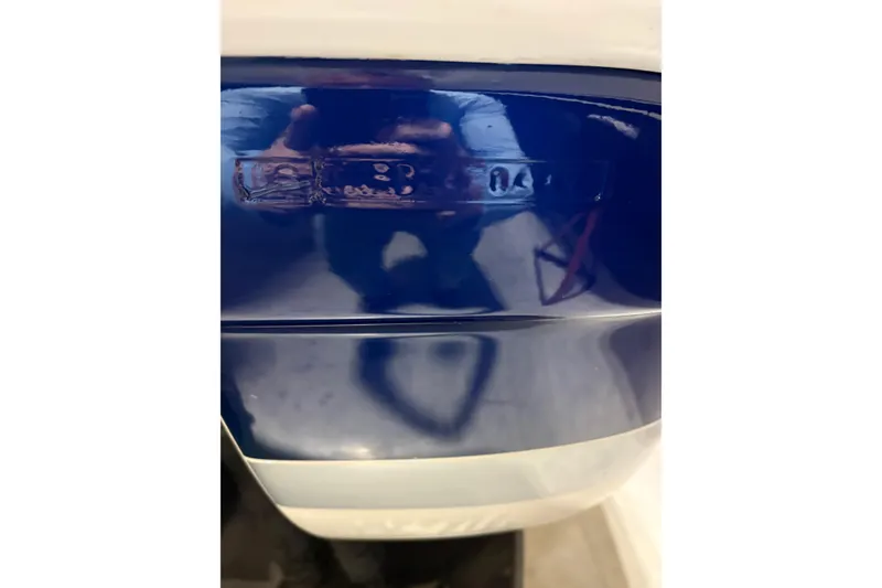 Slide: The Image of Close-up of a 2004 Formula 400 Super Sport boat hull with reflection. - 8