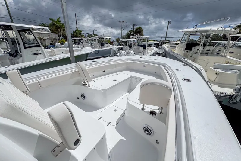 Slide: The Image of 2026 Sea Hunt Gamefish 30 with forward seating in harbor. - 10
