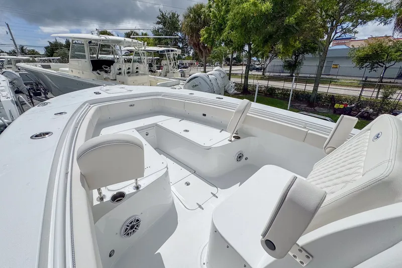 Slide: The Image of 2026 Sea Hunt Gamefish 30 with forward seating, white interior. - 11