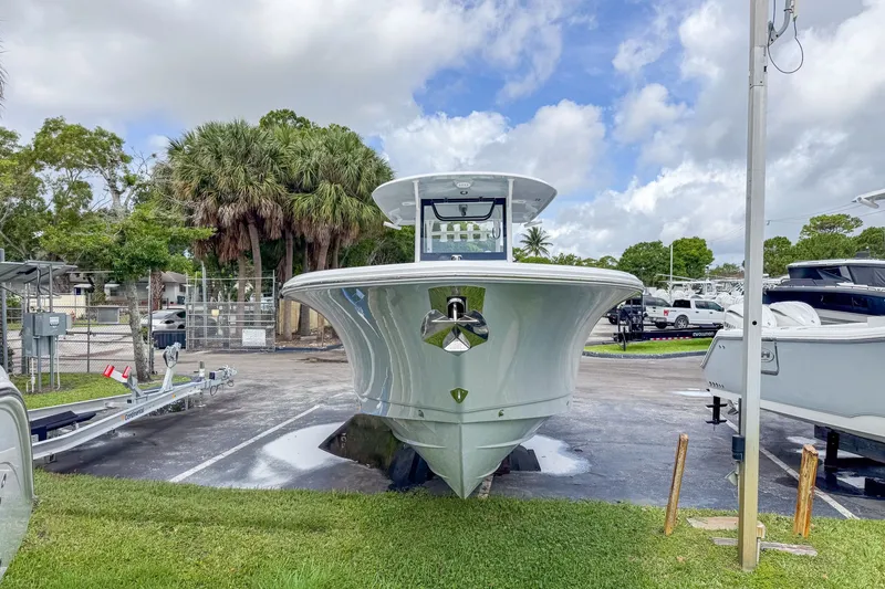 Slide: The Image of 2026 Sea Hunt Gamefish 30 boat on a parking lot. - 4