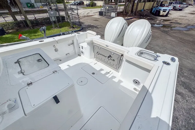 Slide: The Image of Sea Hunt Gamefish 30, 2026, with dual outboard engines. - 7