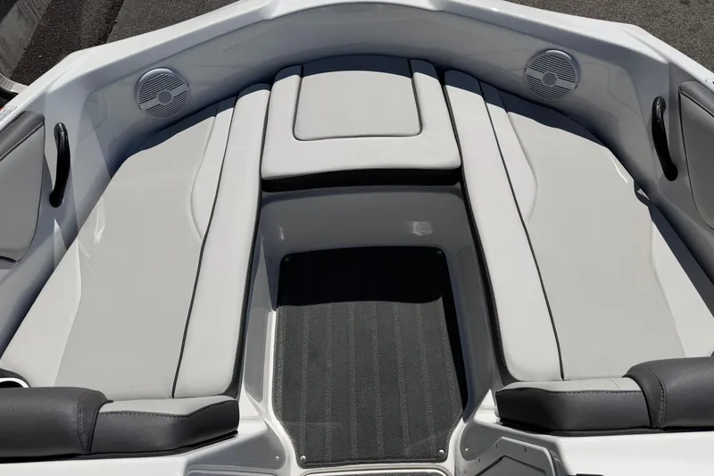 Slide: The Image of Interior view of 2026 Yamaha Boats AR190, featuring sleek seating and integrated speakers. - 14