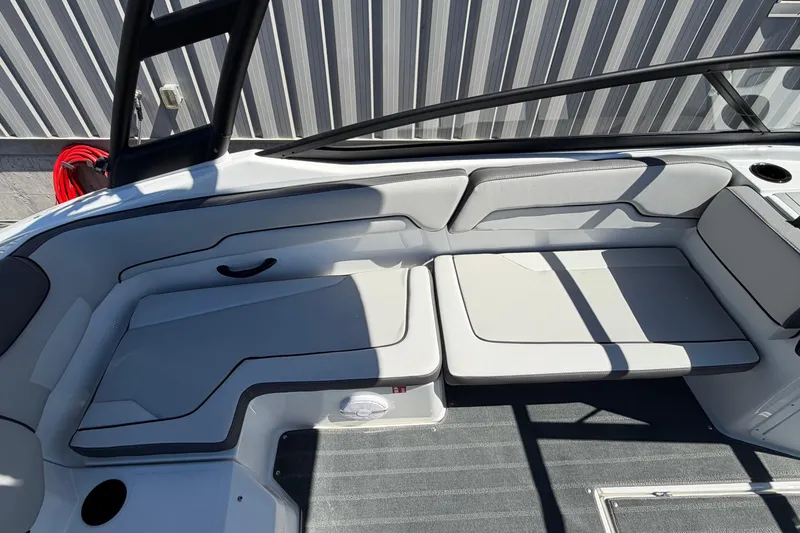 Slide: The Image of 2026 Yamaha Boats AR190 interior seating with sleek, modern design and comfortable upholstery. - 17