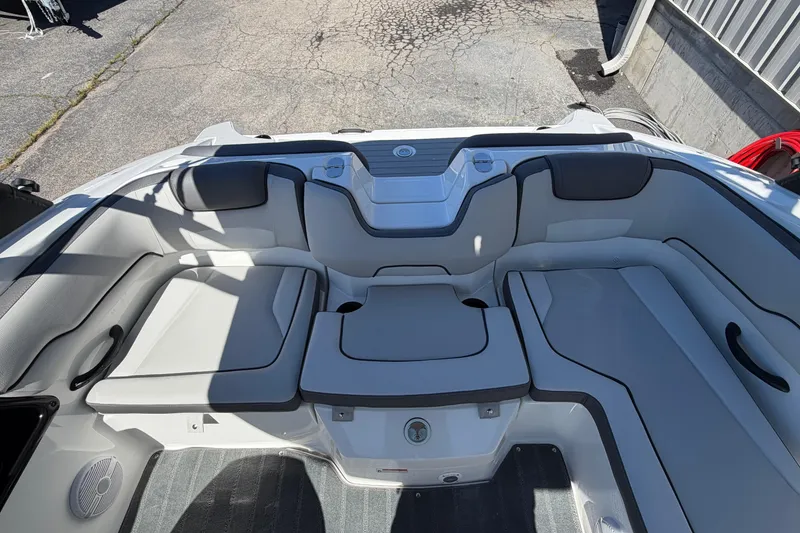 Slide: The Image of 2026 Yamaha Boats AR190 interior with cushioned seating and storage compartments. - 20
