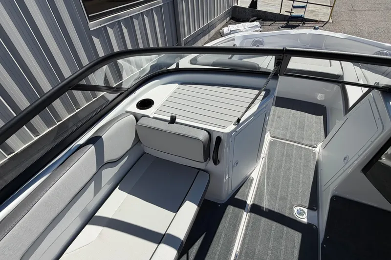 Slide: The Image of 2026 Yamaha Boats AR190 interior with seating and storage, featuring sleek design and modern amenities. - 21