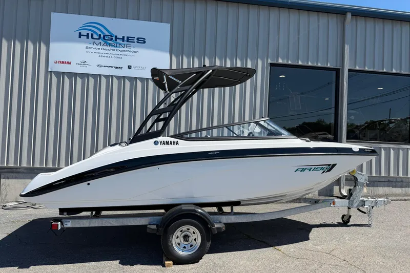 Slide: The Image of 2026 Yamaha Boats AR190 on trailer outside Hughes Marine building. - 22