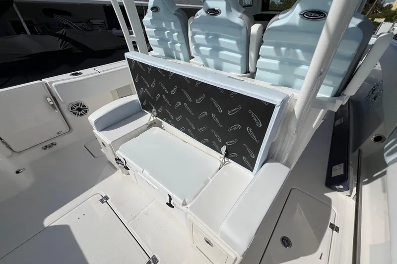 Slide: The Image of 2026 Robalo R300 Center Console boat interior with seating and storage compartments. - 17
