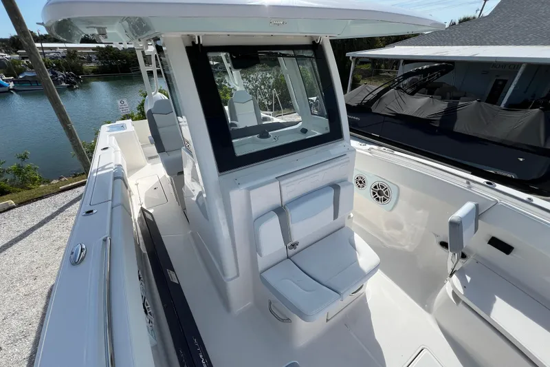 Slide: The Image of 2026 Robalo R300 Center Console boat with sleek design and spacious seating. - 39