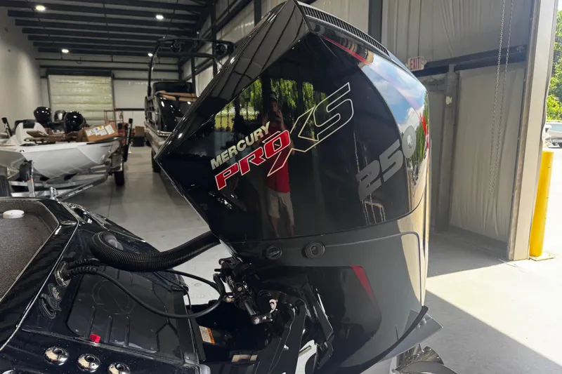 Slide: The Image of 2022 Ranger Z520R with Mercury Pro XS 250 engine in a showroom. - 15