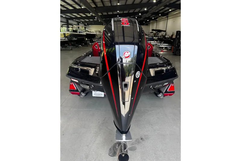 Slide: The Image of 2022 Ranger Z520R boat in showroom, rear view with powerful outboard motor. - 17