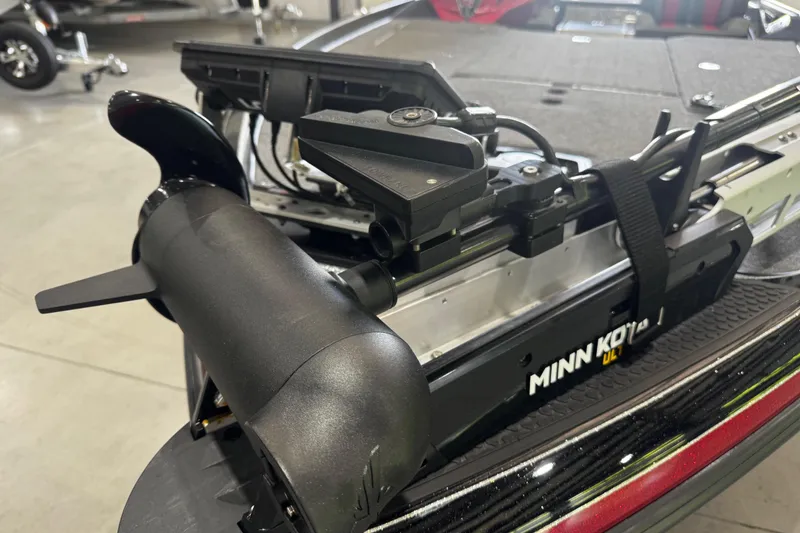 Slide: The Image of 2022 Ranger Z520R boat with Minn Kota trolling motor in a showroom. - 9