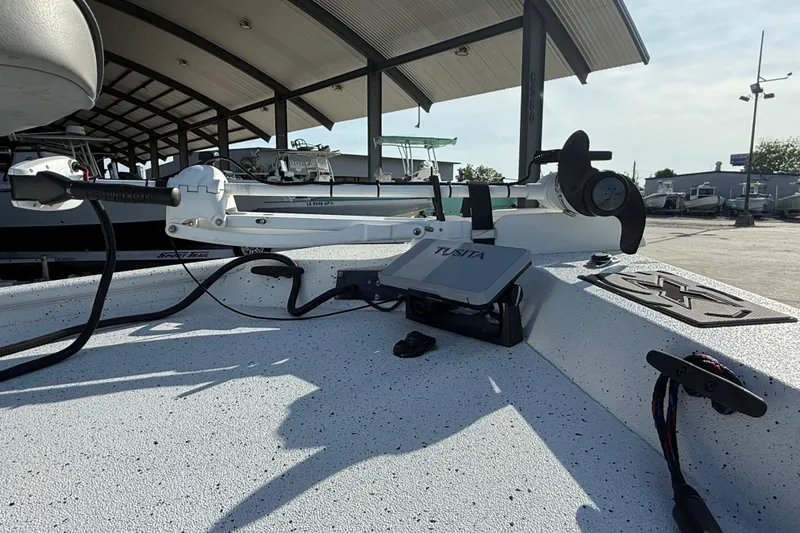 Slide: The Image of 2021 Alumaweld Xpress boat deck with trolling motor and navigation equipment. - 12