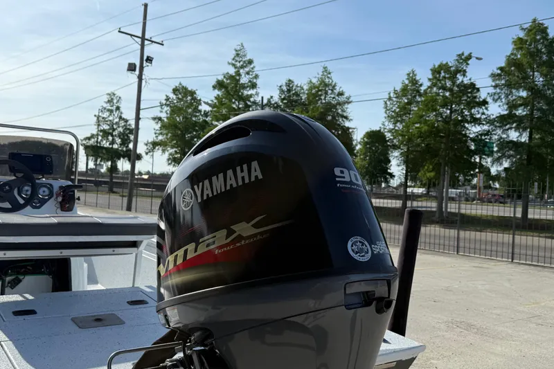 Slide: The Image of 2021 Alumaweld Xpress boat with Yamaha Vmax 90 outboard motor in a sunny outdoor setting. - 9