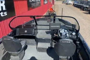 Slide: The Image of 2021 Nitro ZV19 boat interior with dual seats and control panel. - 4
