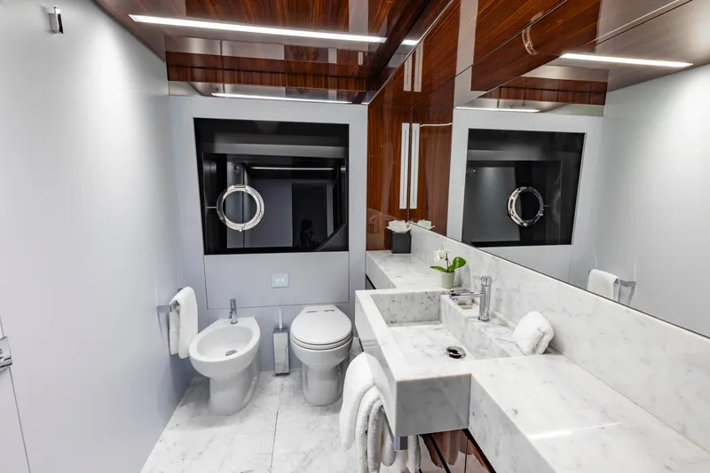 Slide: The Image of Luxurious bathroom on 2020 Riva 110' Dolcevita yacht with marble sink and modern fixtures. - 15
