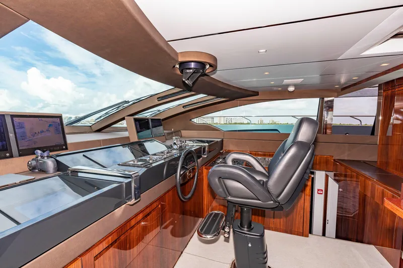 Slide: The Image of Luxurious helm of 2020 Riva 110' Dolcevita yacht with modern navigation systems. - 27