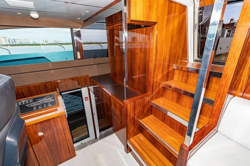 Slide: The Image of Luxurious interior of 2020 Riva 110' Dolcevita yacht with elegant wood finishes. - 30