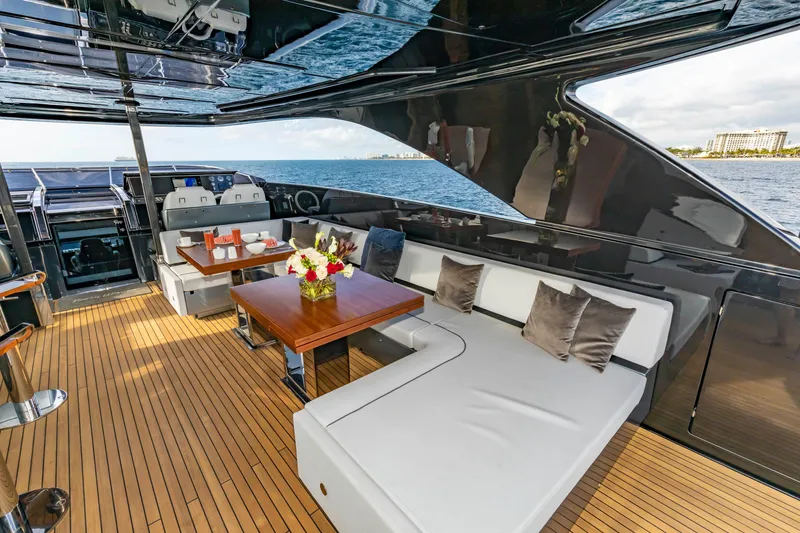 Slide: The Image of Luxurious 2020 Riva 110' Dolcevita yacht interior with elegant seating and ocean view. - 32