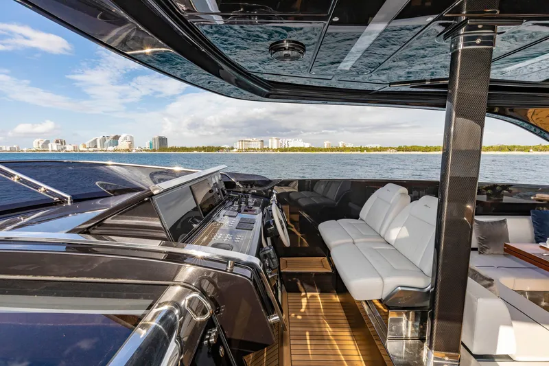 Slide: The Image of Luxurious 2020 Riva 110' Dolcevita yacht interior with ocean view and modern seating. - 34
