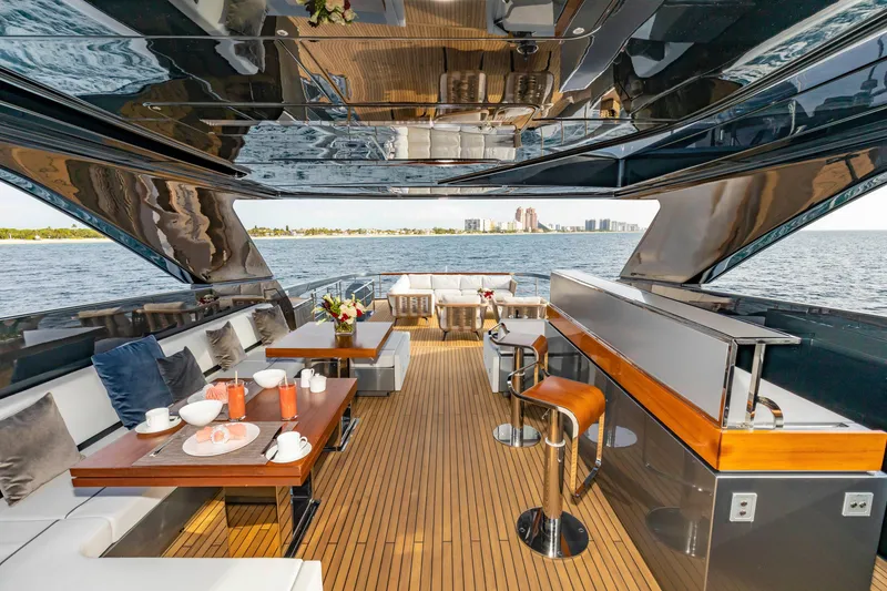 Slide: The Image of Luxurious 2020 Riva 110' Dolcevita yacht deck with elegant seating and ocean view. - 36